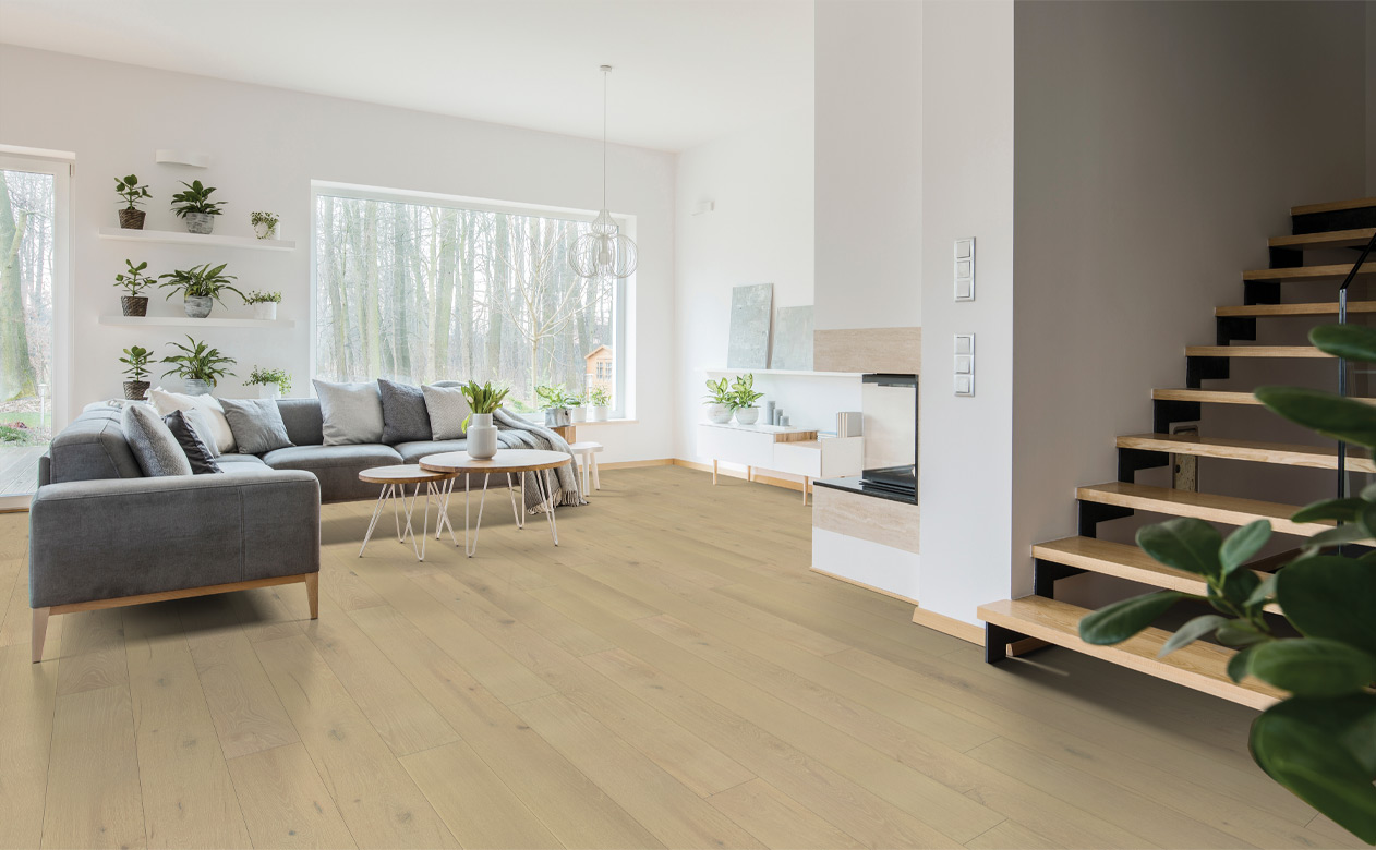 hardwood flooring in living room with plants and biophilic interior design elements.
