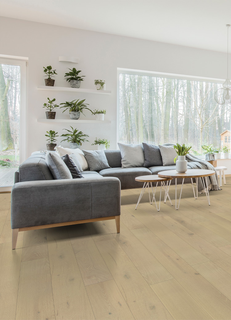 hardwood flooring in living room with plants and biophilic interior design elements.